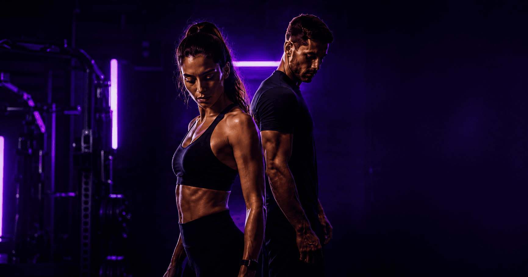Athletes training under bold purple gym lighting